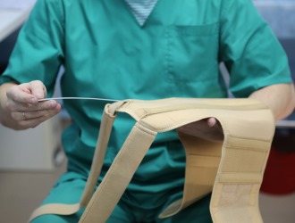 При сращении позвонков L5 и S1 может потребоваться ношение ортопедического корсета