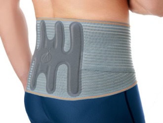 В домашних условиях замедлить развитие грыжи можно с помощью бандажа