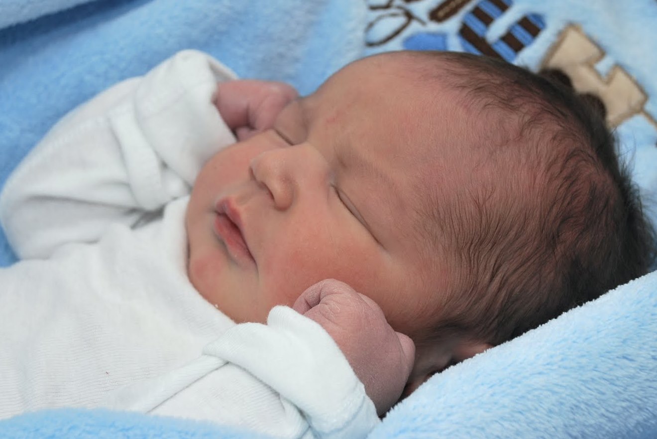 Новорожденный малыш