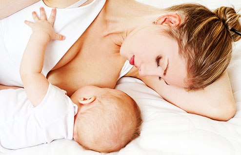 Кормящая мать